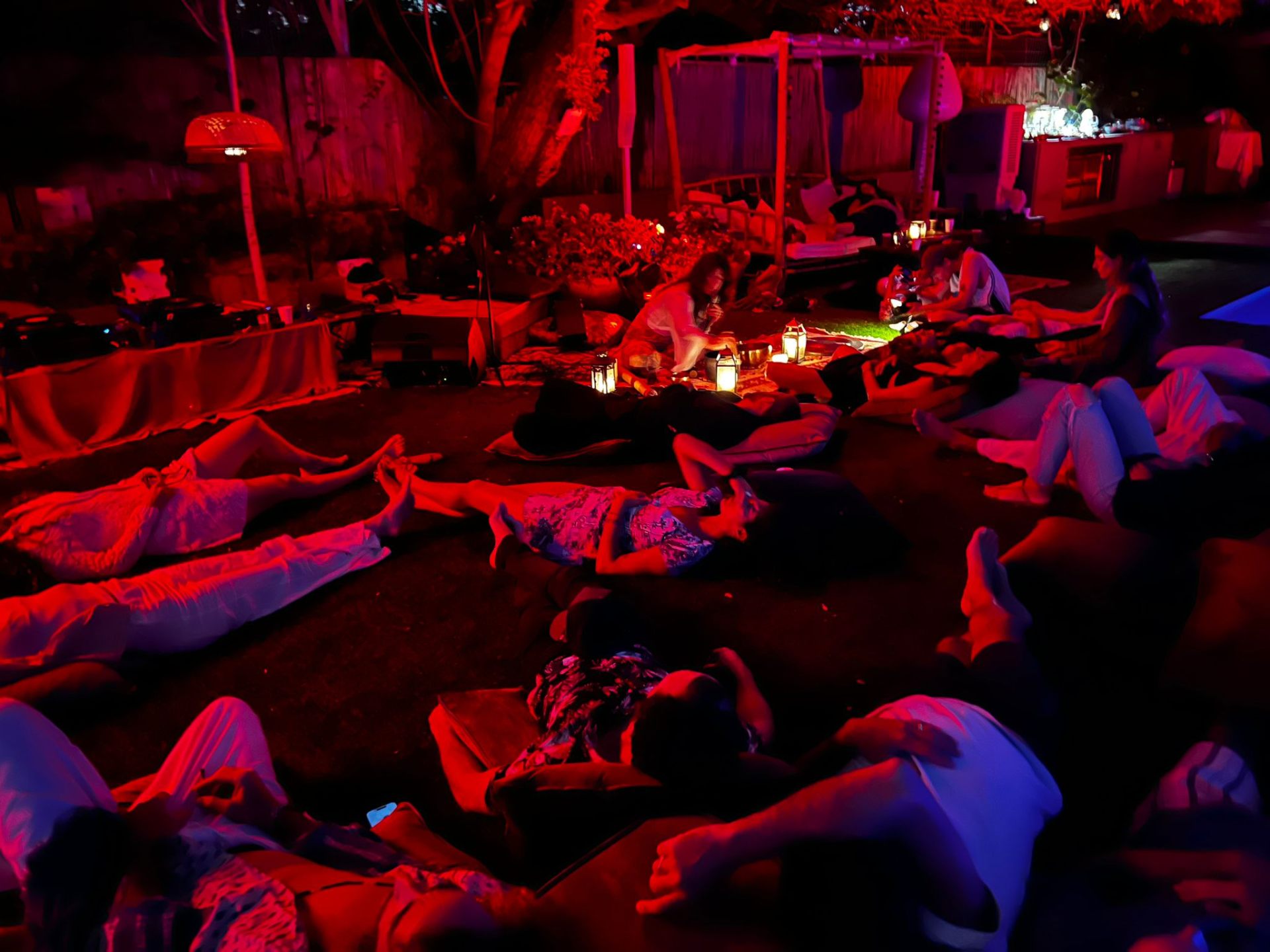 Red-lit garden ceremony.