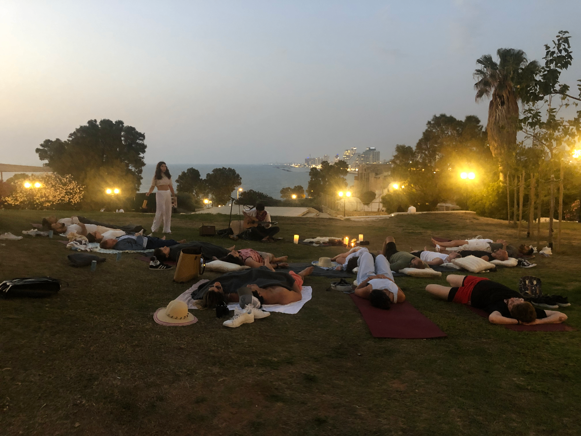 Sound bath at dusk by the sea.